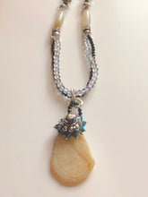 Raw Cut Stone Pendant on Crystal Gemstone Necklace.