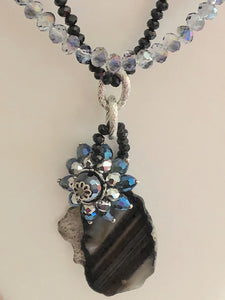 Raw Cut Stone Pendant on Crystal Gemstone Necklace.