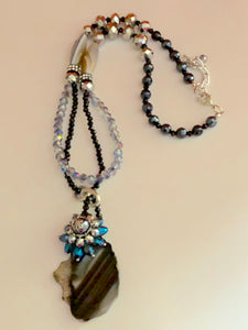 Raw Cut Stone Pendant on Crystal Gemstone Necklace.